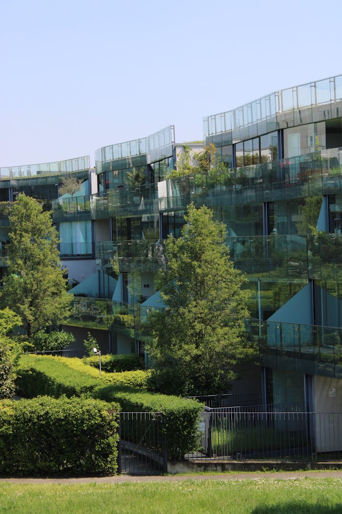 Explore sustainable architecture with urban greenery in contemporary Milan buildings.